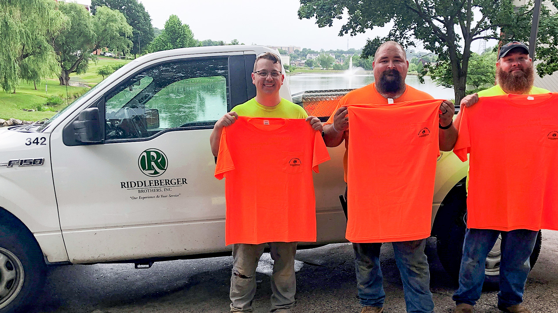 Safety Champions for June 2022 holding their safety shirts