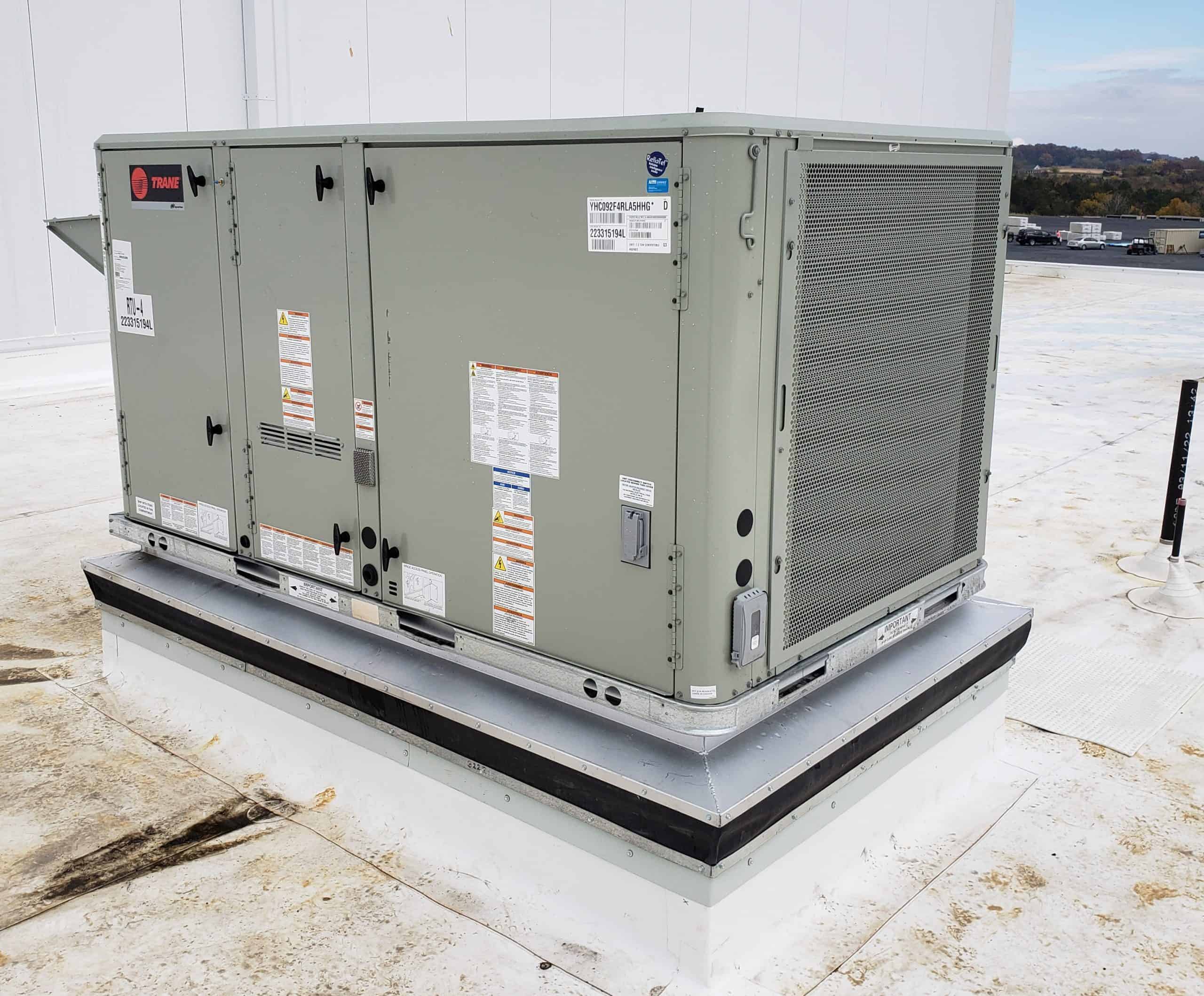 Rooftop Trane commercial packaged HVAC unit installed on top of a building