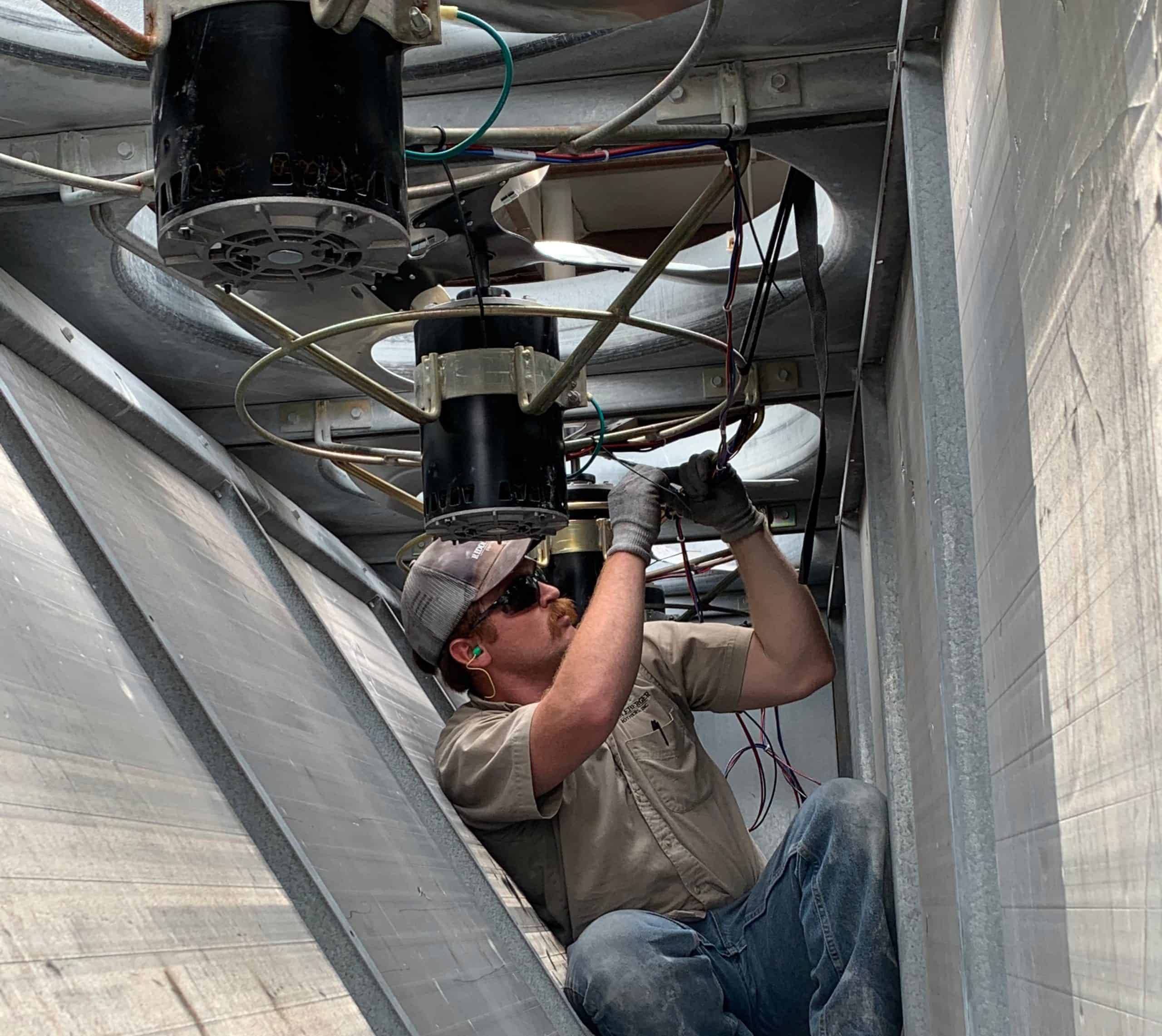 RBI technician wiring fans for HVAC system