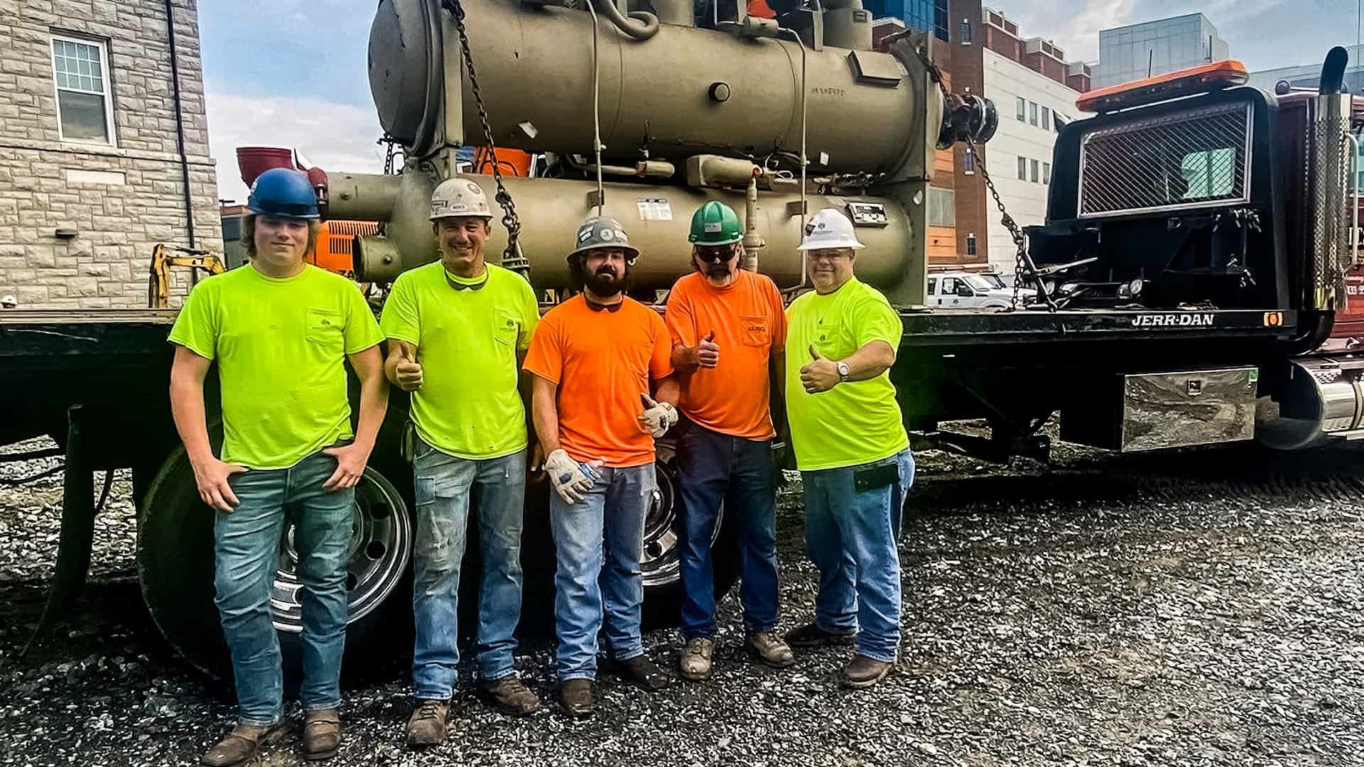 RBI employees Bo McCoy, Freddy Martin, Jason Morrison, Garrett Morrison, Matt Edwards, and Greg Baker standing in front of a truck