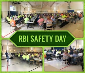 RBI Safety Day - employees gathered in a hall listening to a speaker.