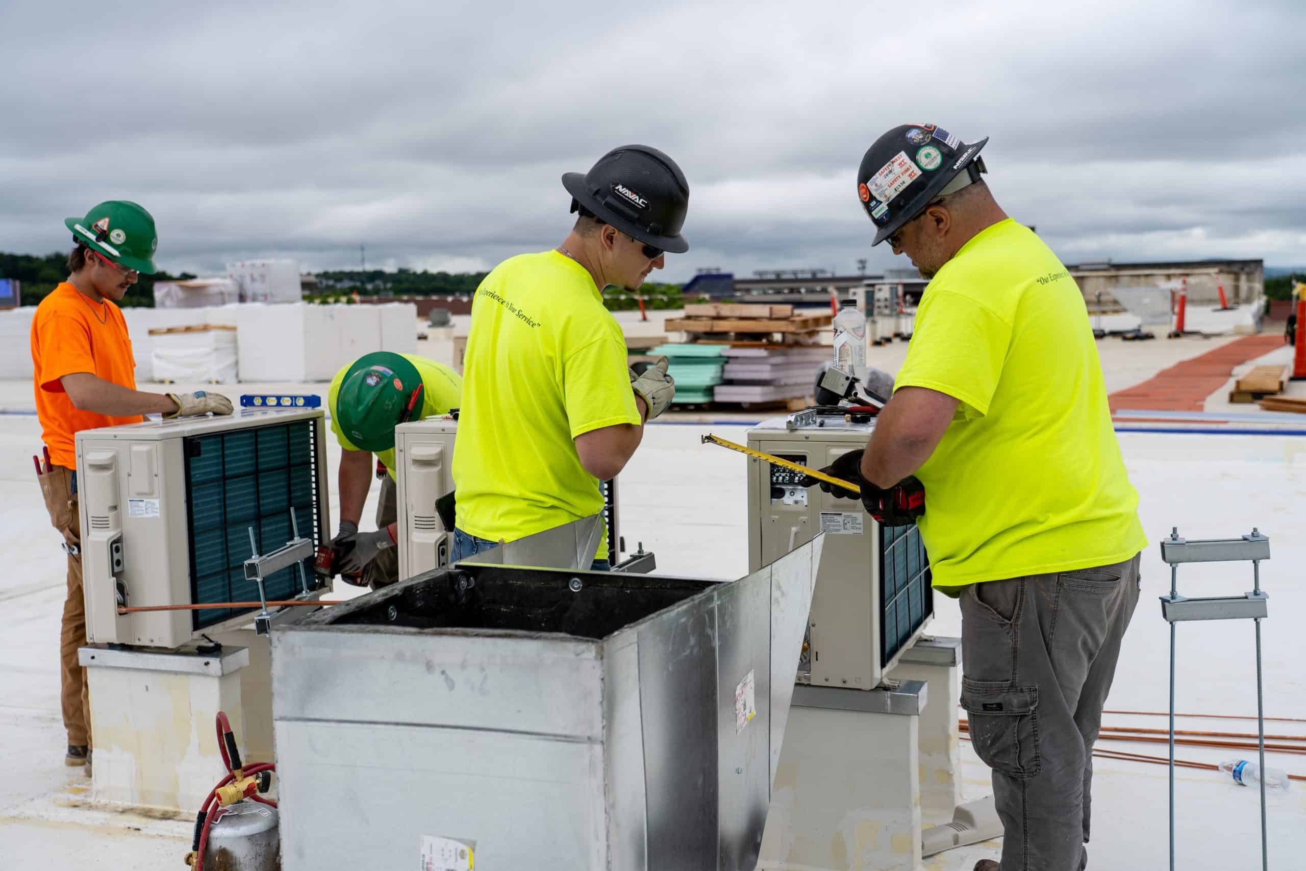 RBI team installing a rooftop HVAC unit