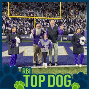 RBI Top Dog, Lacey and family, on JMU's field