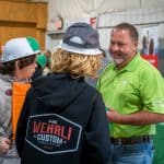 RBI employee talking with students